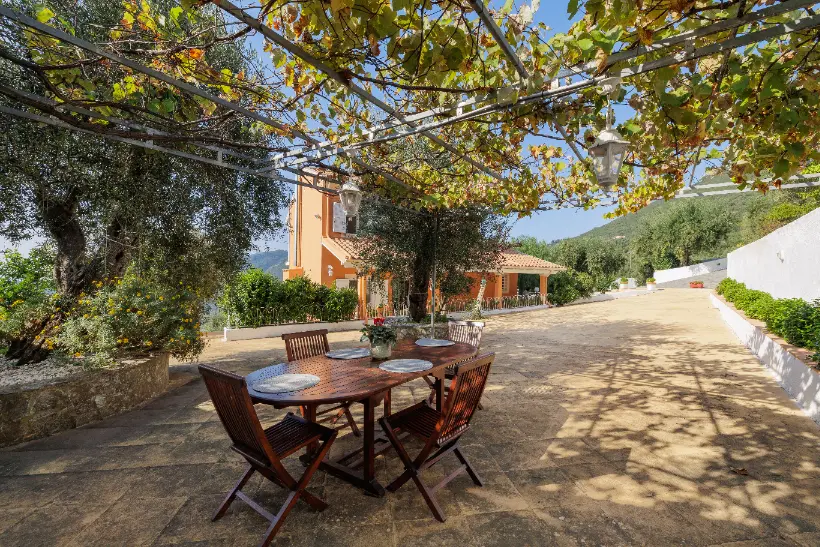 Beautiful garden area of Ef Zin Villa with comfortable seating