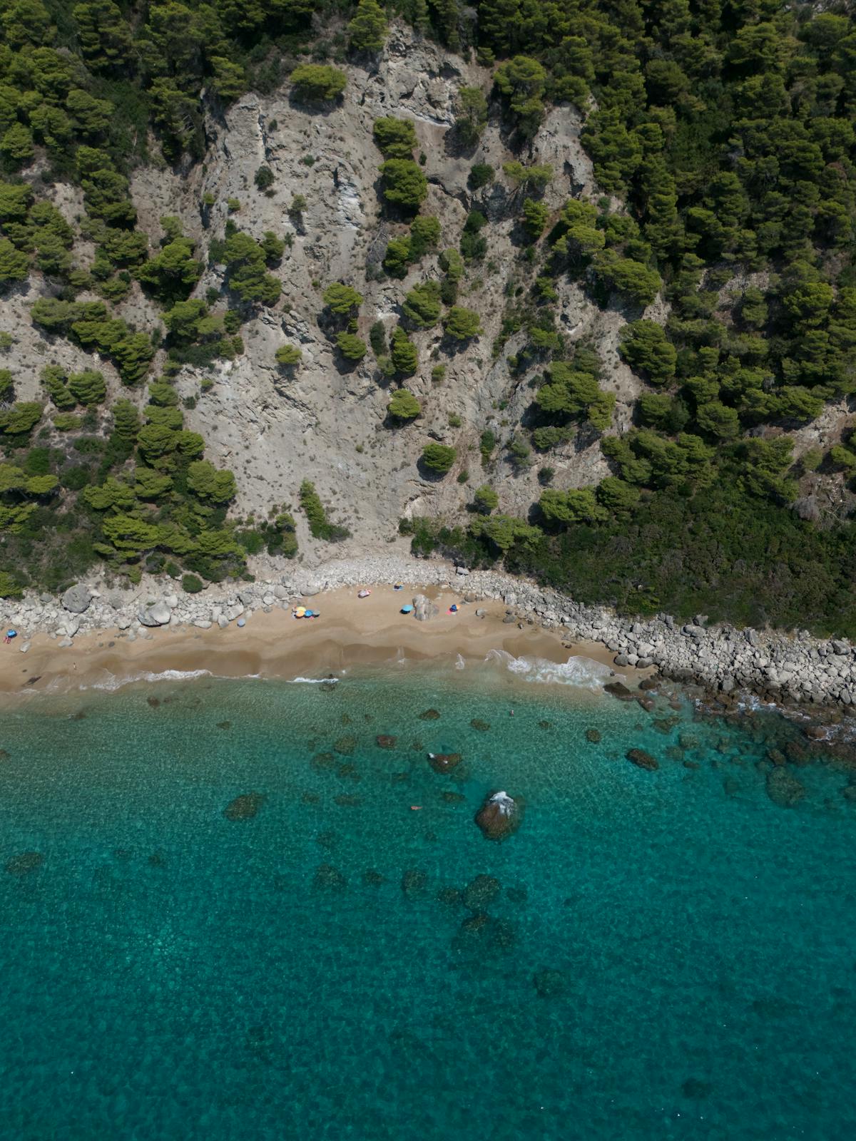 Boat trip through turquoise waters near Paleokastritsa cliffs in Corfu
